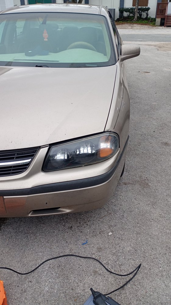 Clear, restored vehicle headlight after headlight restoring